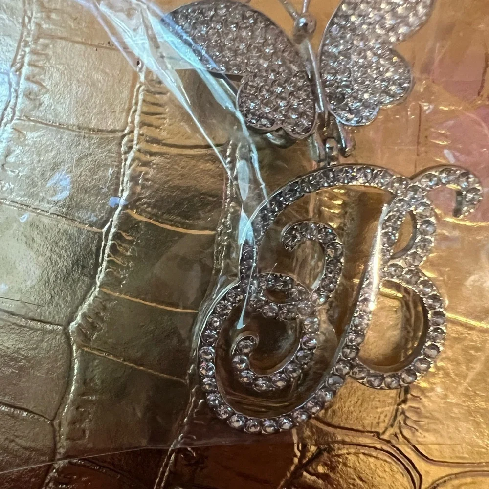 Elegant Silver “B” Butterfly Pendant
